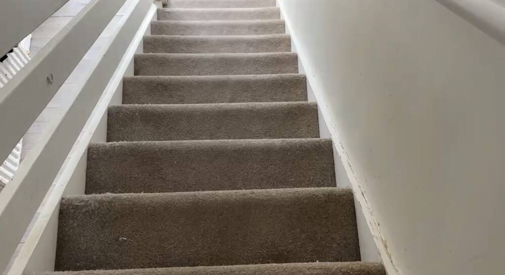 Stair carpet before cleaning